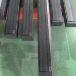 Motorized floor rising screen